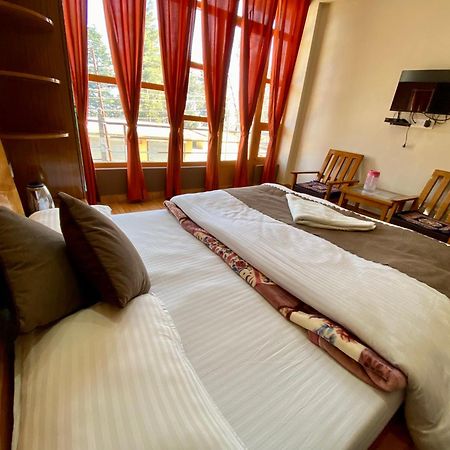 Hotel Mansarovar Inn Munsyari Экстерьер фото