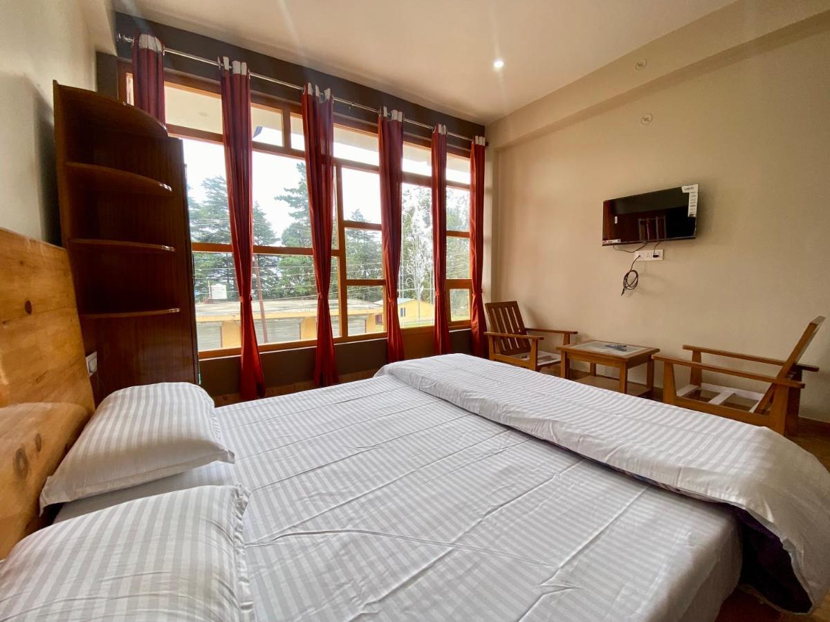 Hotel Mansarovar Inn Munsyari Экстерьер фото